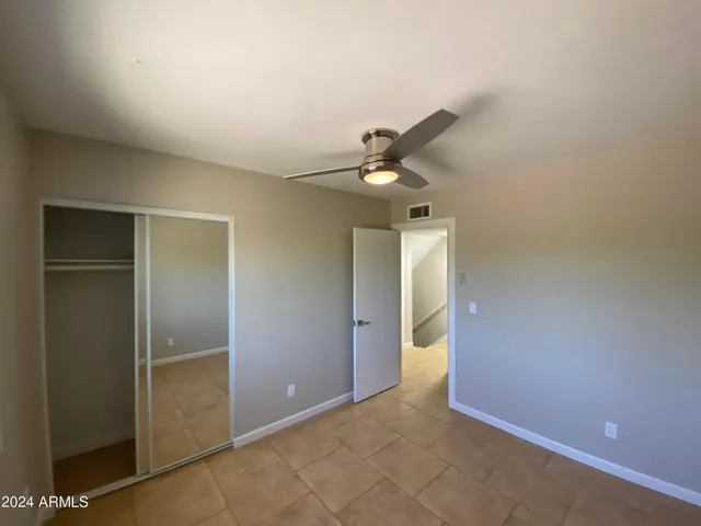 an empty room with a bathroom