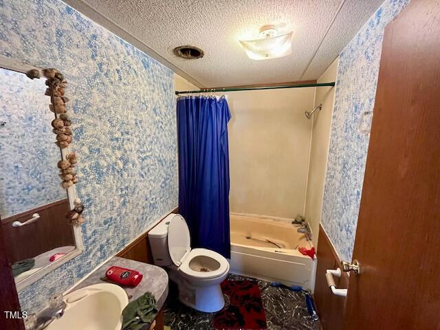 210 Holloway Road Roxboro, NC 27573 - Photo 14 of 15 a bathroom with a toilet and a shower
