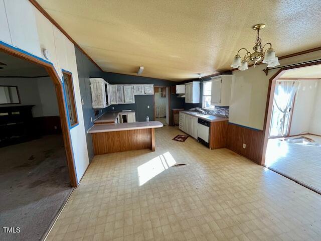 210 Holloway Road Roxboro, NC 27573 - Photo 8 of 15 a kitchen with cabinets and stainless steel appliances