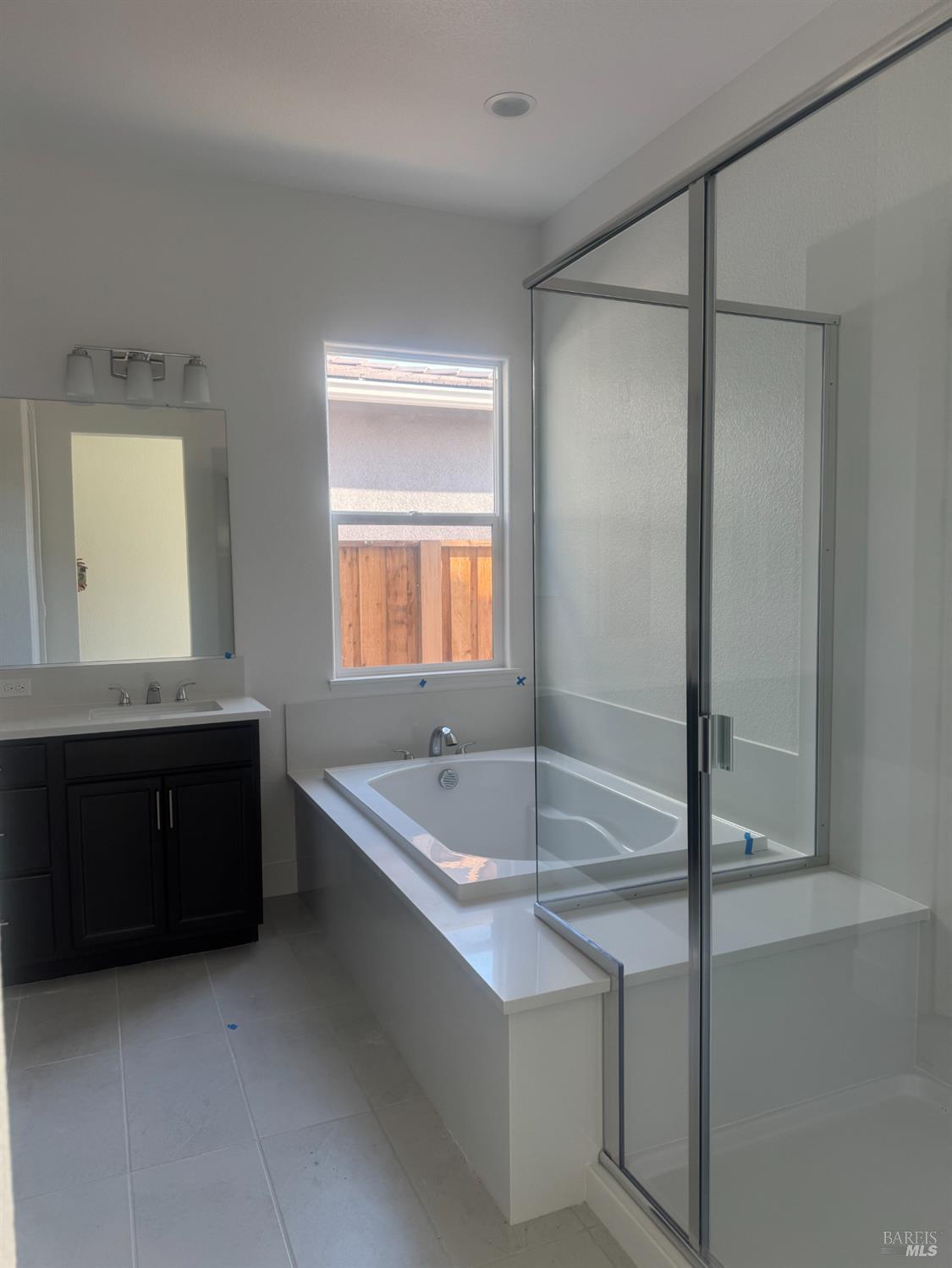 727 Temescal Street Antioch, CA 94561 - Photo 7 of 7 a spacious bathroom with a bathtub and a sink