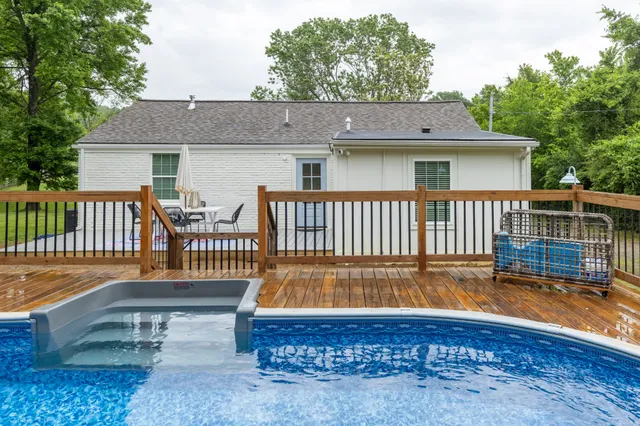 a view of a roof deck with chair