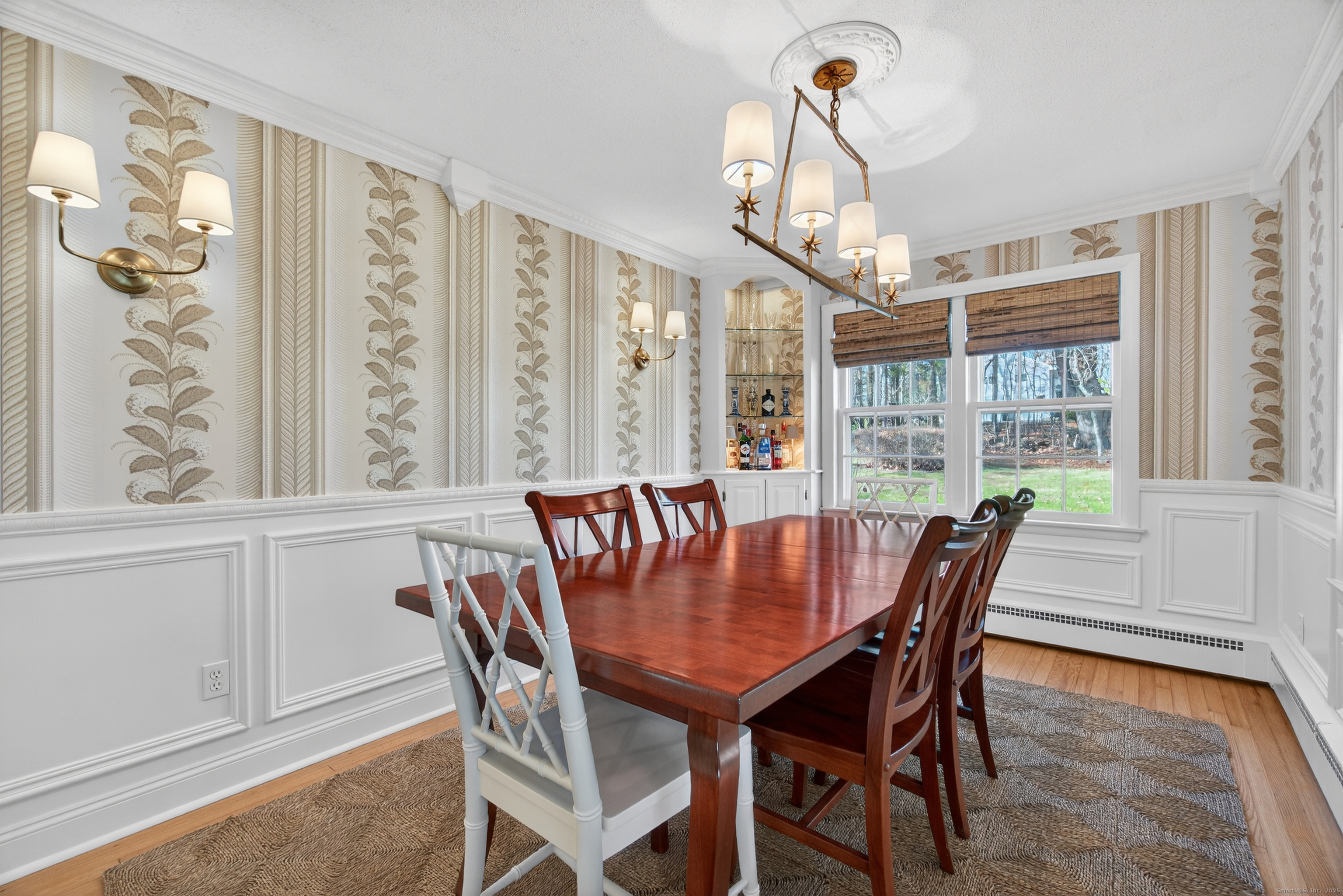 84 Hop Brook Road Simsbury, CT 06070 - Photo 14 of 36 a view of a dining room with furniture window and outside view