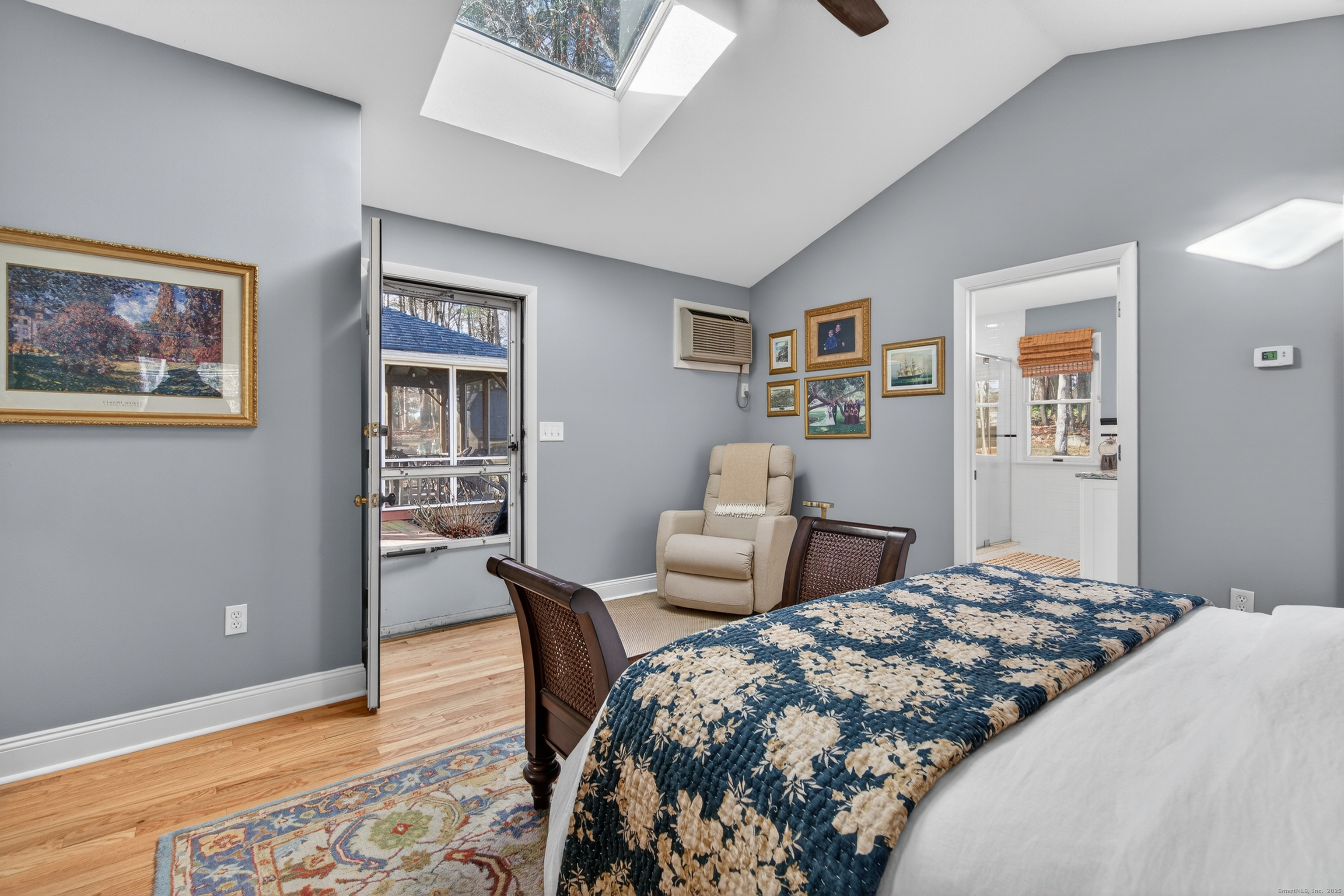 84 Hop Brook Road Simsbury, CT 06070 - Photo 18 of 36 a bedroom with a bed and wooden floor