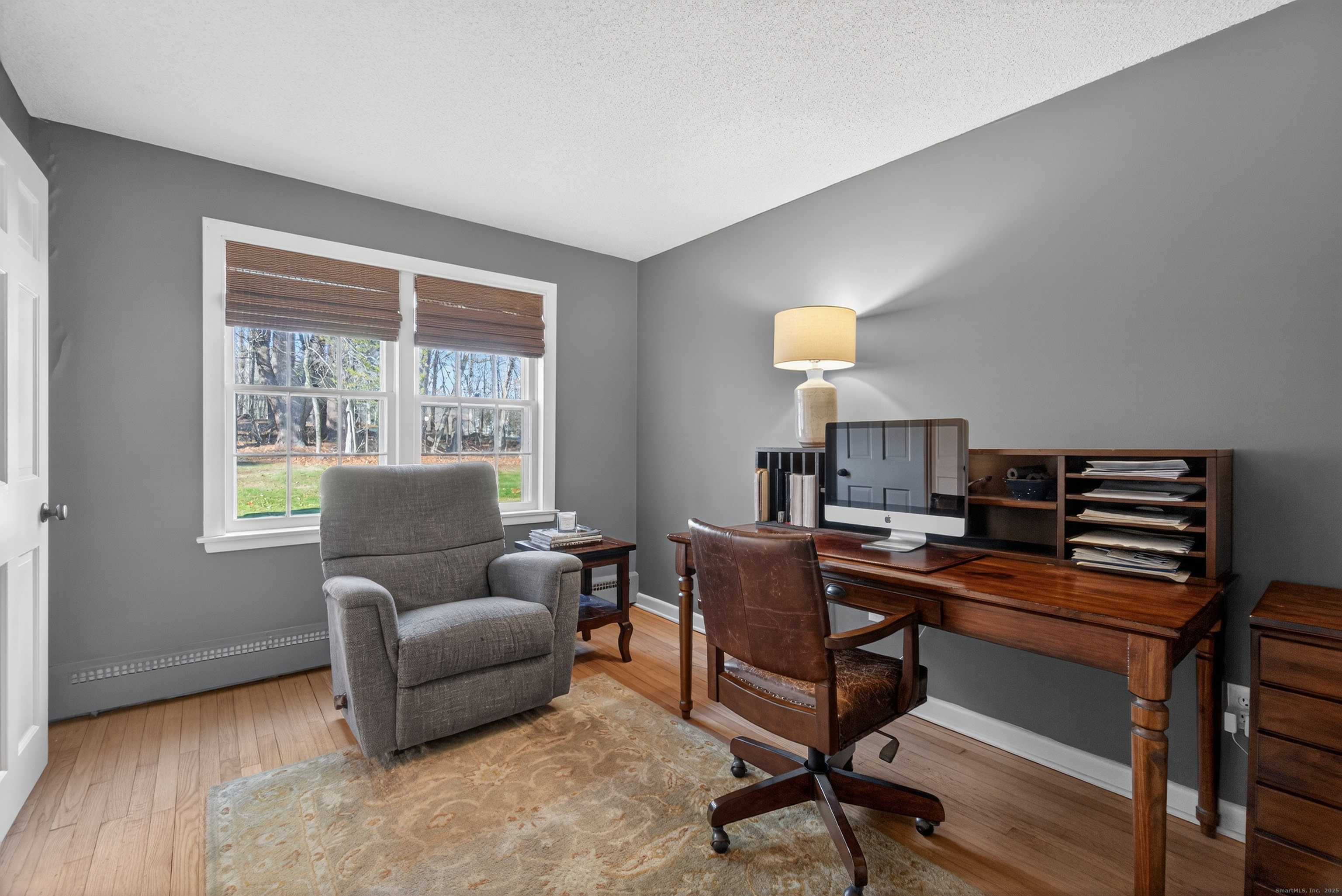 84 Hop Brook Road Simsbury, CT 06070 - Photo 21 of 36 a workspace with furniture and a window