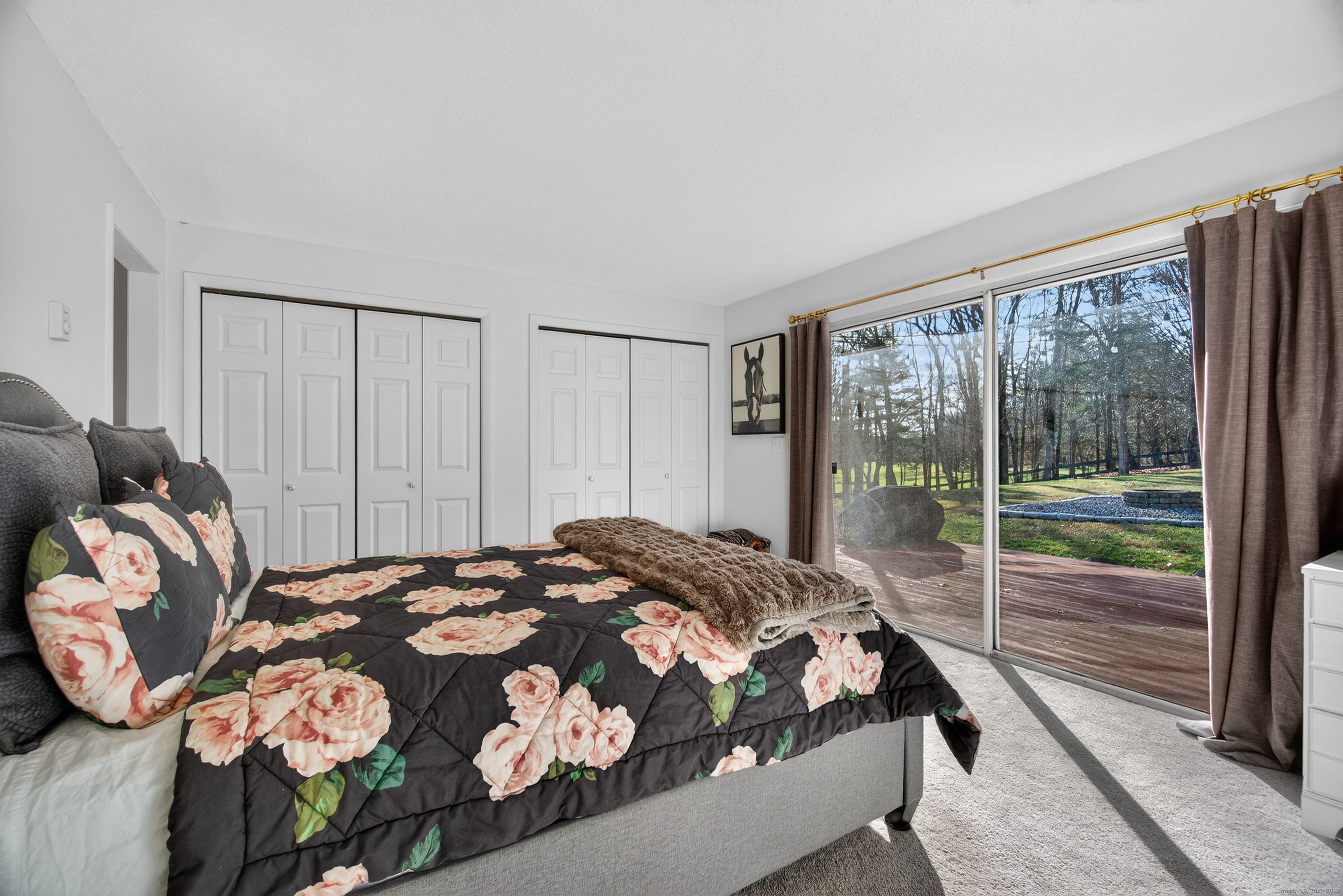 84 Hop Brook Road Simsbury, CT 06070 - Photo 23 of 36 a bedroom with a bed and a window