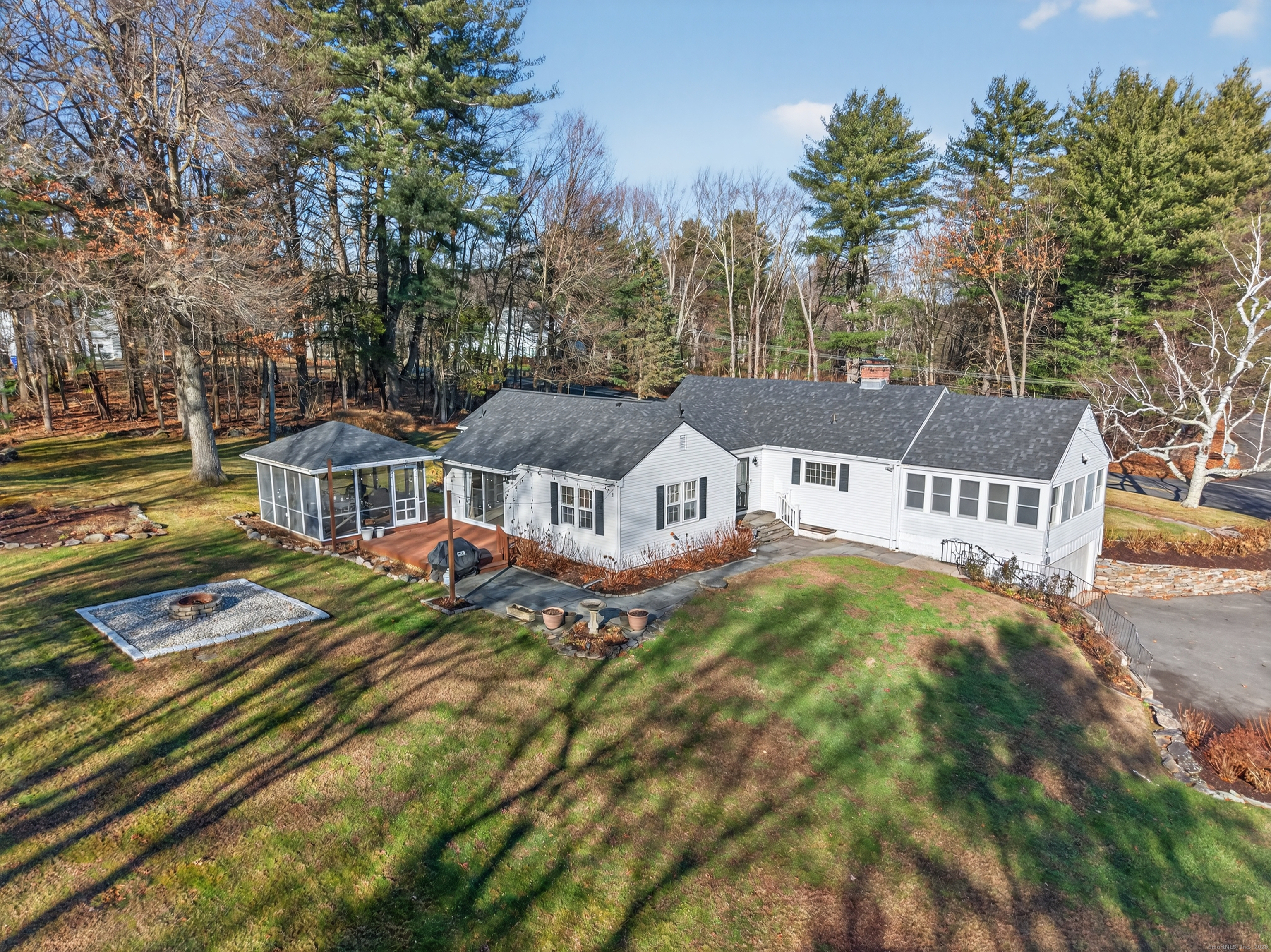 84 Hop Brook Road Simsbury, CT 06070 - Photo 29 of 36 aerial view of a house with a yard