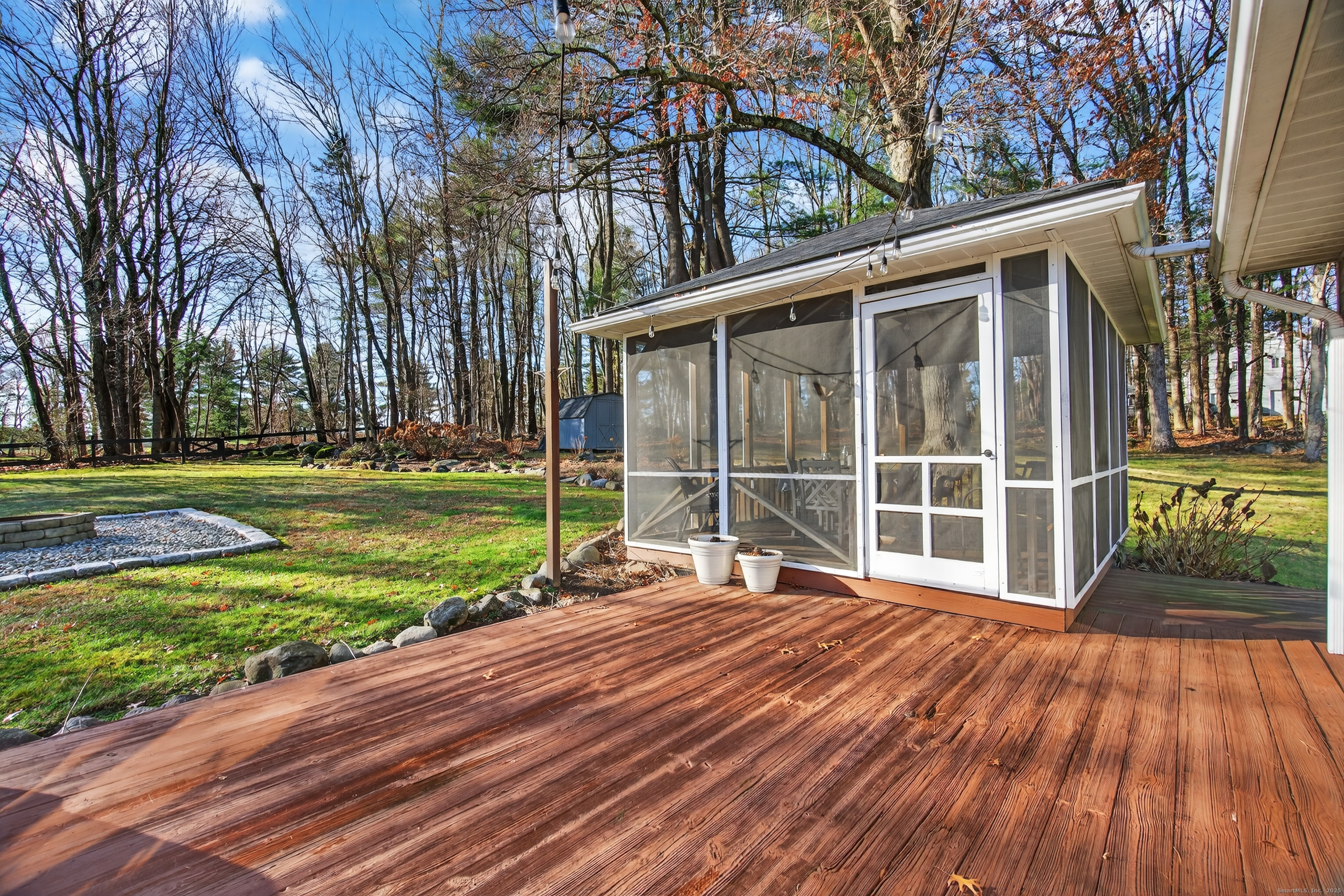 84 Hop Brook Road Simsbury, CT 06070 - Photo 30 of 36 a view of a house with a yard and wooden floor