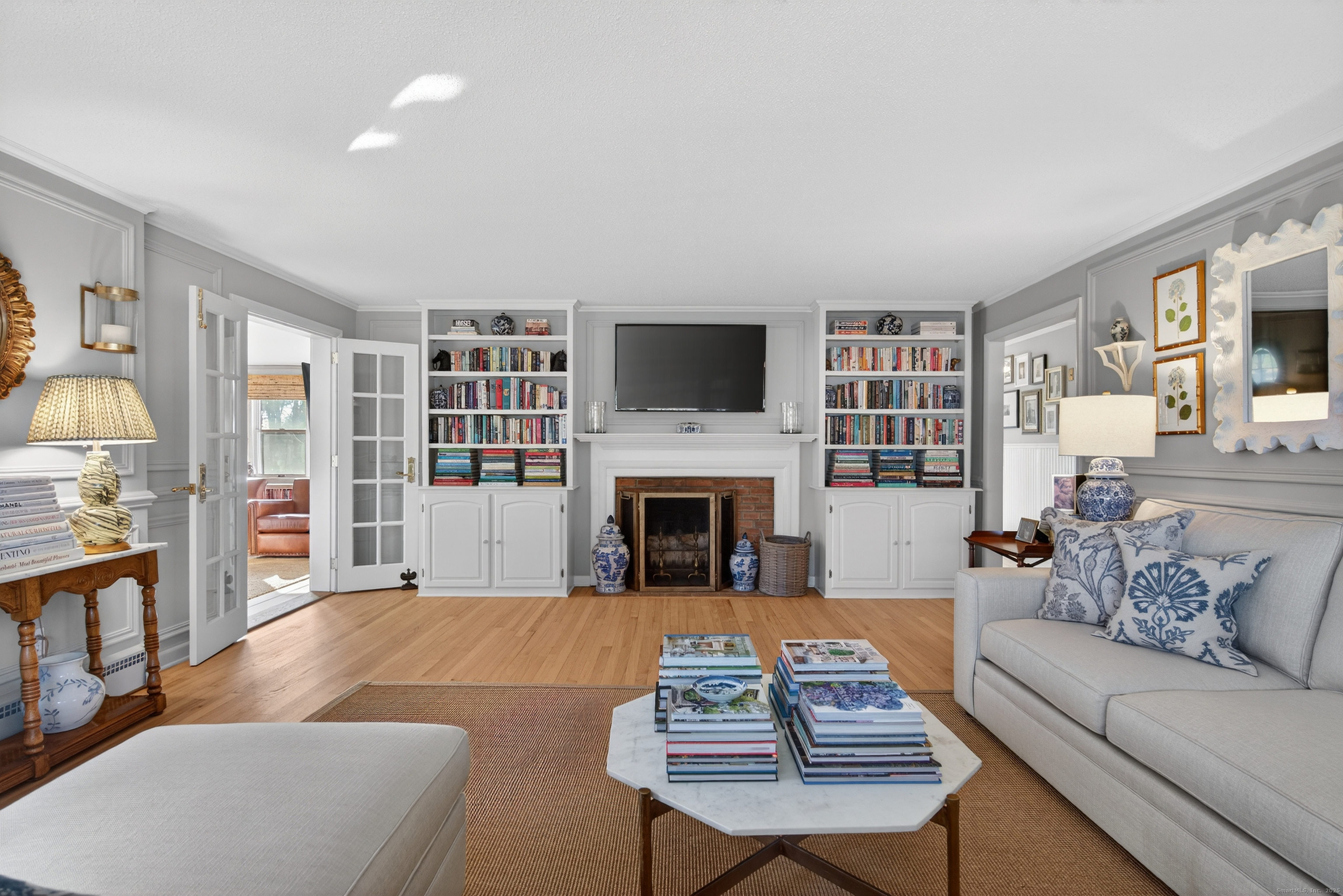 84 Hop Brook Road Simsbury, CT 06070 - Photo 6 of 36 a living room with furniture fireplace and flat screen tv