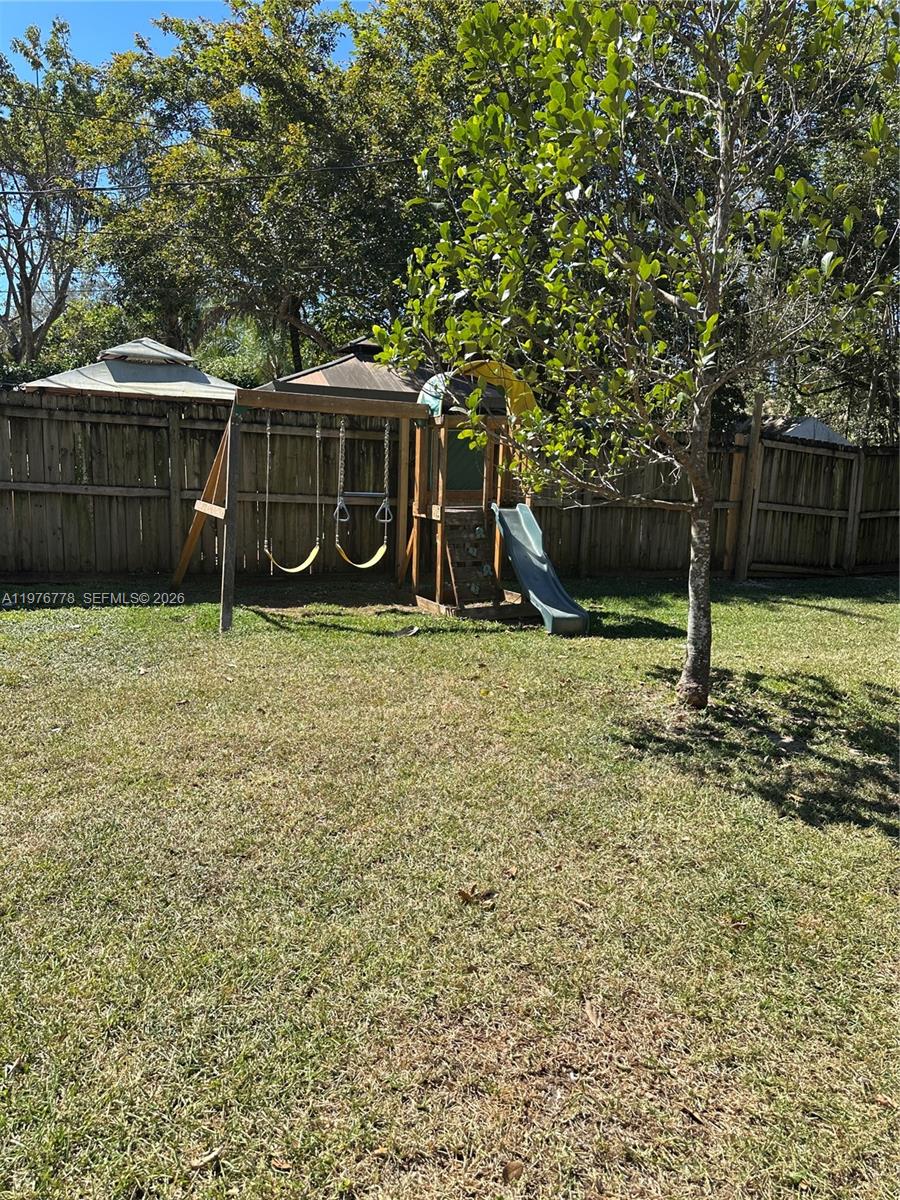 22840 Southwest 155th Avenue, Unit 2 Miami, FL 33170 - Photo 12 of 13 a view of a backyard