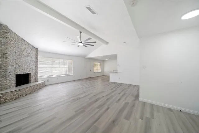 a kitchen with a sink stove and refrigerator