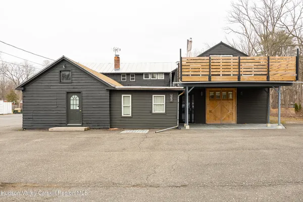 a front view of a house with a garage