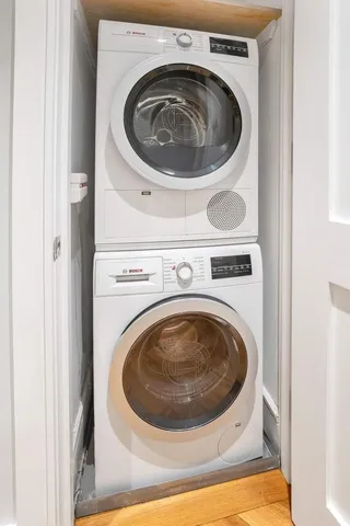 a utility room with dryer and washer