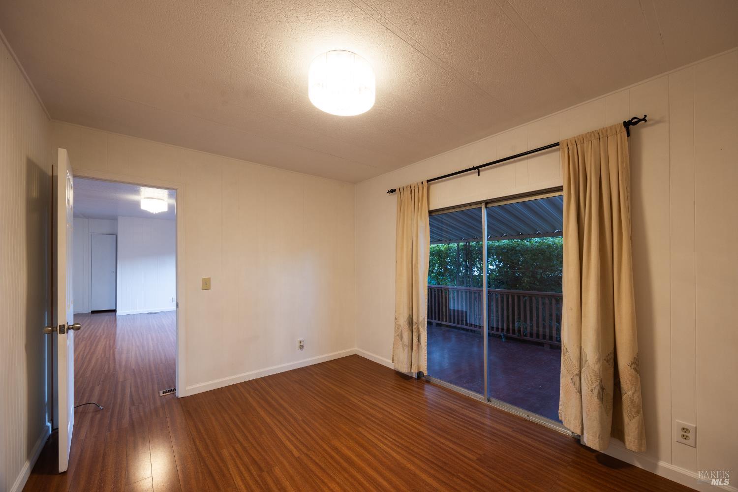 275 Carlsbad Court San Rafael, CA 94903 - Photo 15 of 32 wooden floor in an empty room with a window