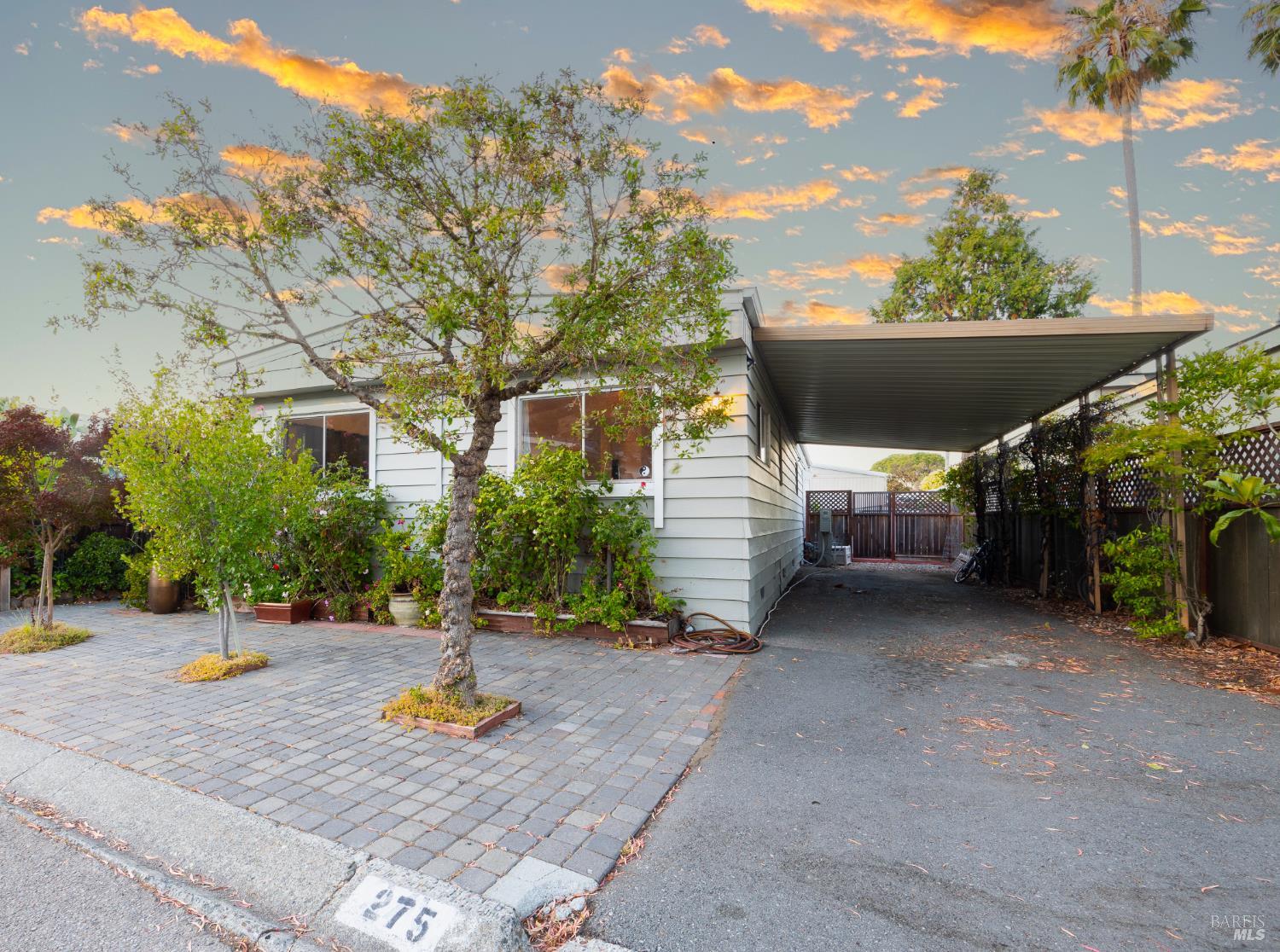 275 Carlsbad Court San Rafael, CA 94903 - Photo 2 of 32 a view of a patio with table and chairs and potted plants