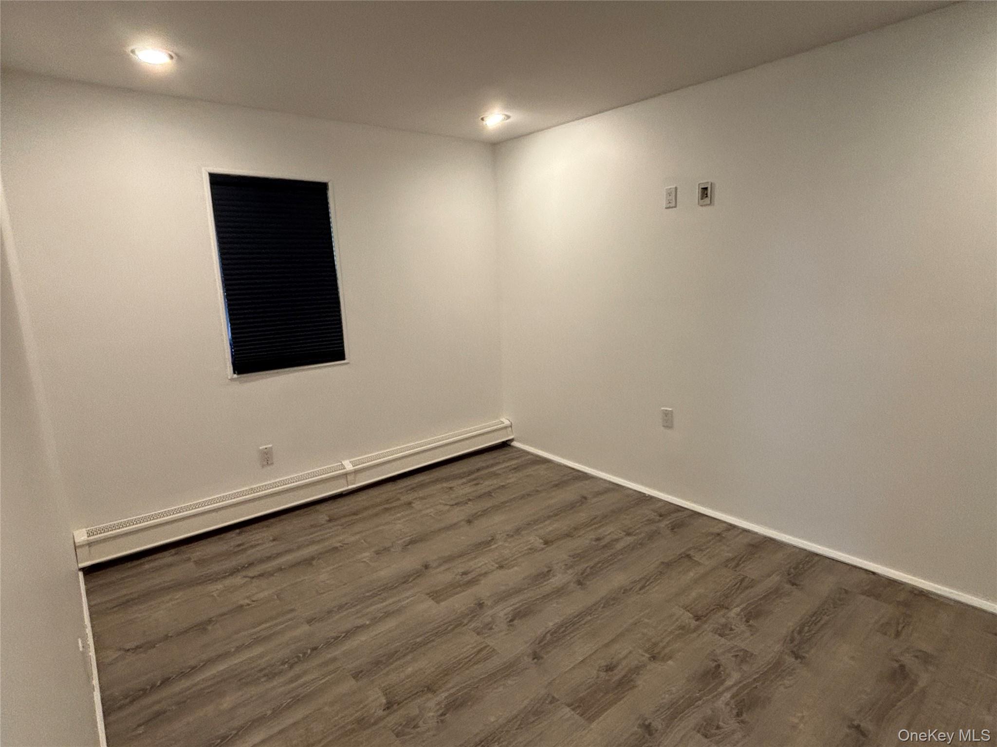 40 Canoe Place Road, Unit 4 Hampton Bays, NY 11946 - Photo 16 of 36 a view of an empty room