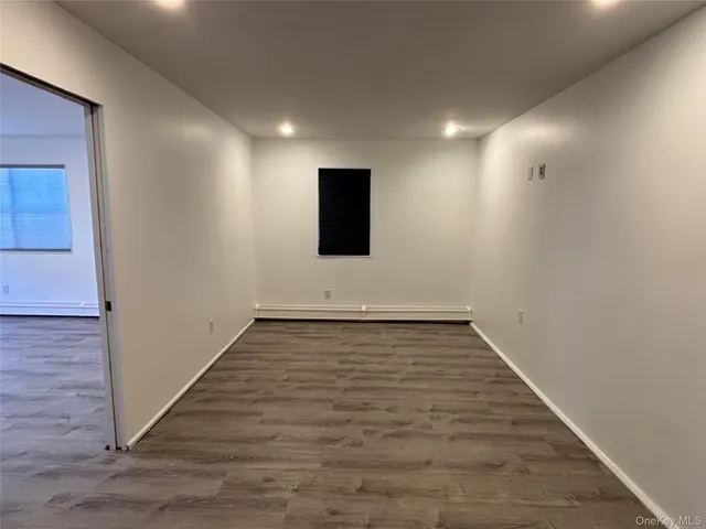 a bathroom with a toilet and shower