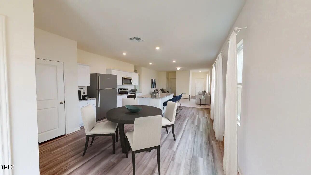 1153 Solace Way Rolesville, NC 27571 - Photo 4 of 16 eba35681ee89a747f67f5bce31346187499a86d9