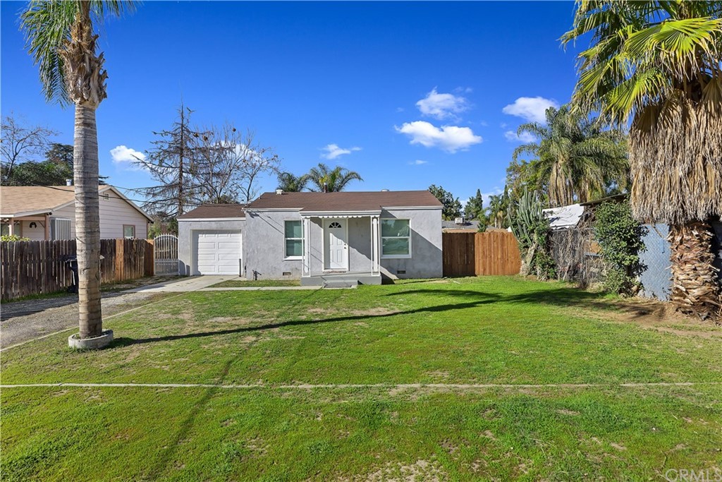 9547 Mason Street Riverside, CA 92503 - Photo 1 of 1 a view of a house with a yard