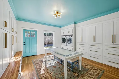a living room with furniture and a table