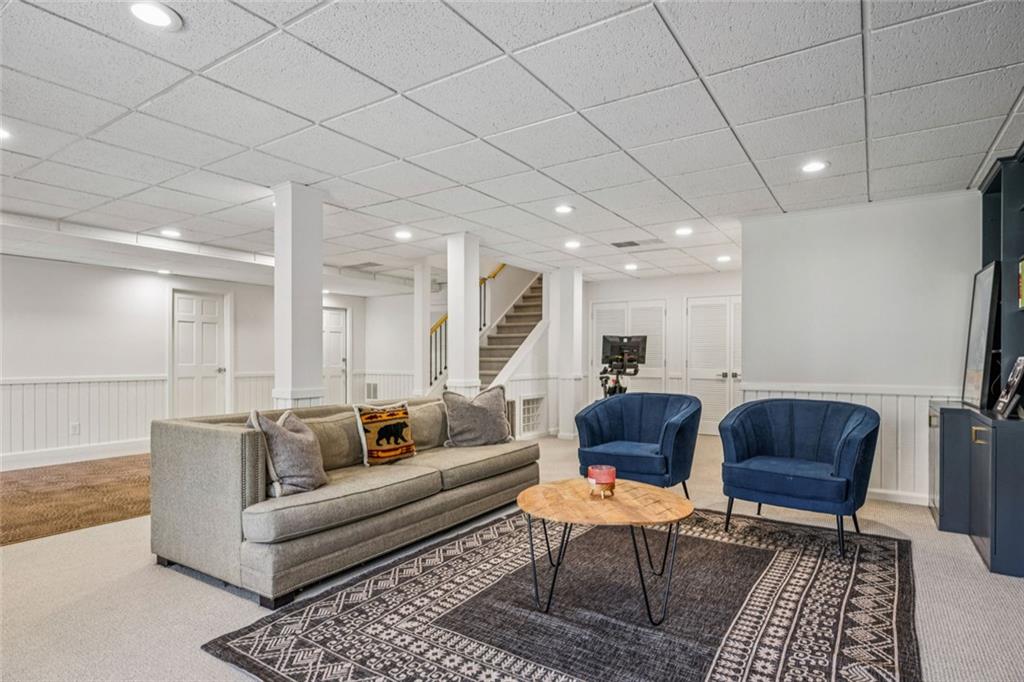 4575 Jett Road Atlanta, GA 30327 - Photo 30 of 42 a living room with furniture and a rug