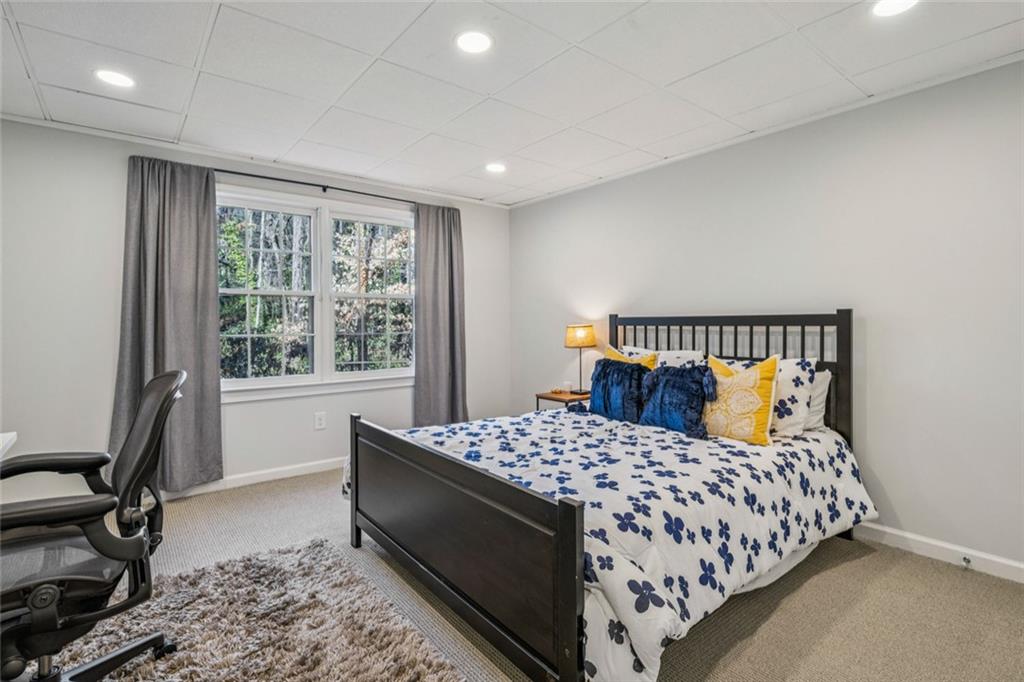 4575 Jett Road Atlanta, GA 30327 - Photo 32 of 42 a bedroom with a bed and a window
