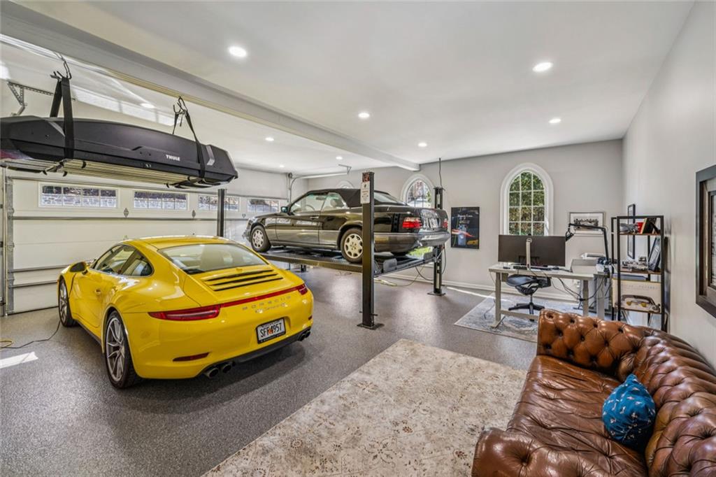 4575 Jett Road Atlanta, GA 30327 - Photo 34 of 42 a living room with furniture washer and a flat screen tv