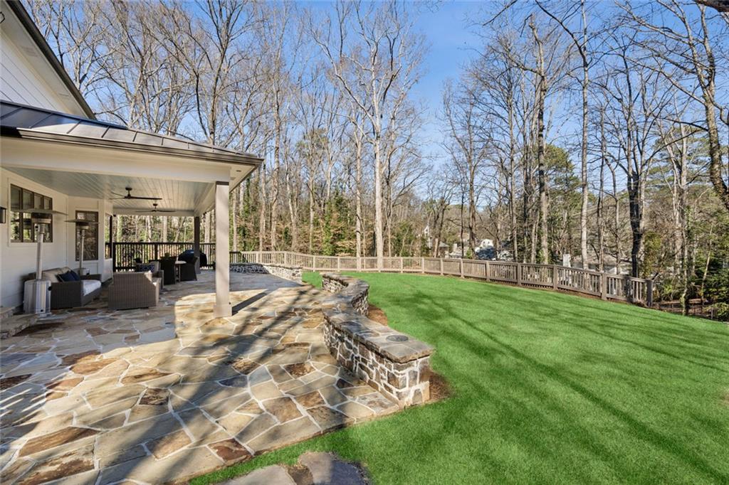 4575 Jett Road Atlanta, GA 30327 - Photo 37 of 42 a view of a yard with table and chairs