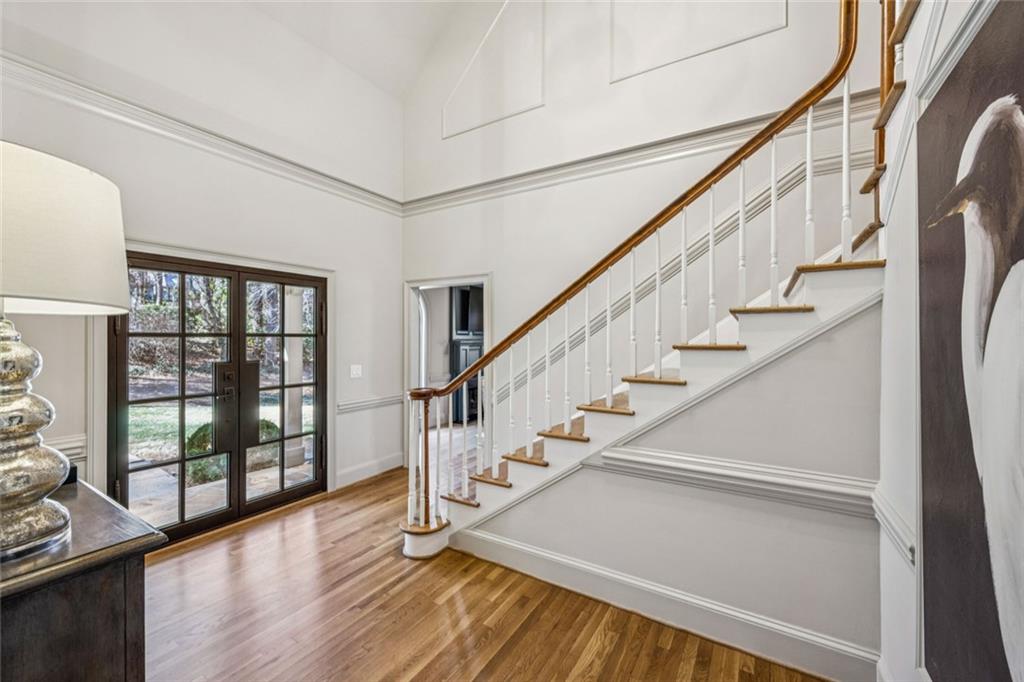 4575 Jett Road Atlanta, GA 30327 - Photo 4 of 42 a view of entryway and hall with wooden floor