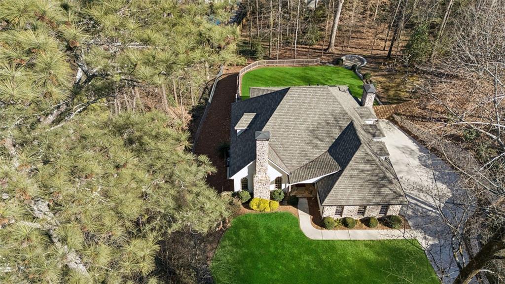 4575 Jett Road Atlanta, GA 30327 - Photo 42 of 42 an aerial view of a house with a yard and large tree