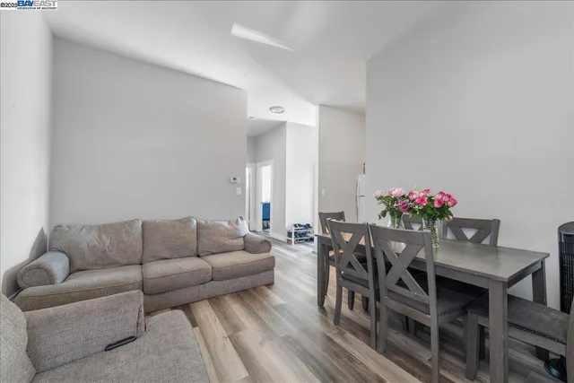 a bedroom with a bed and a tv