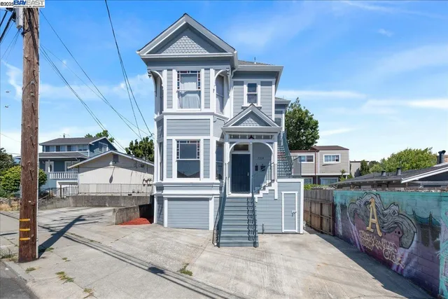 a view of a house with a street