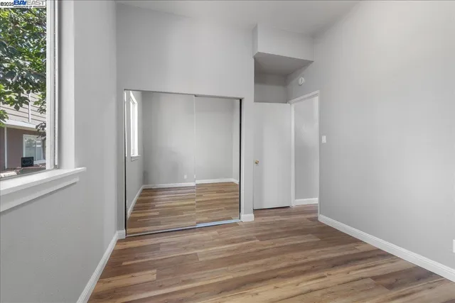 a bathroom with a sink toilet and a mirror