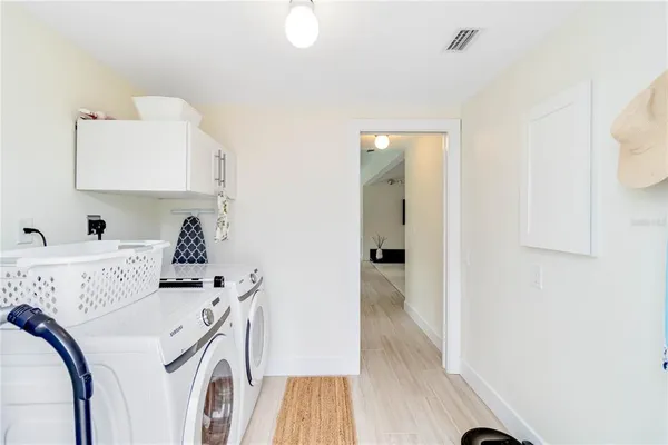 a view of living room with washer and dryer