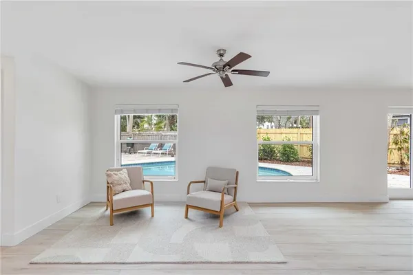 a living room with furniture and a window