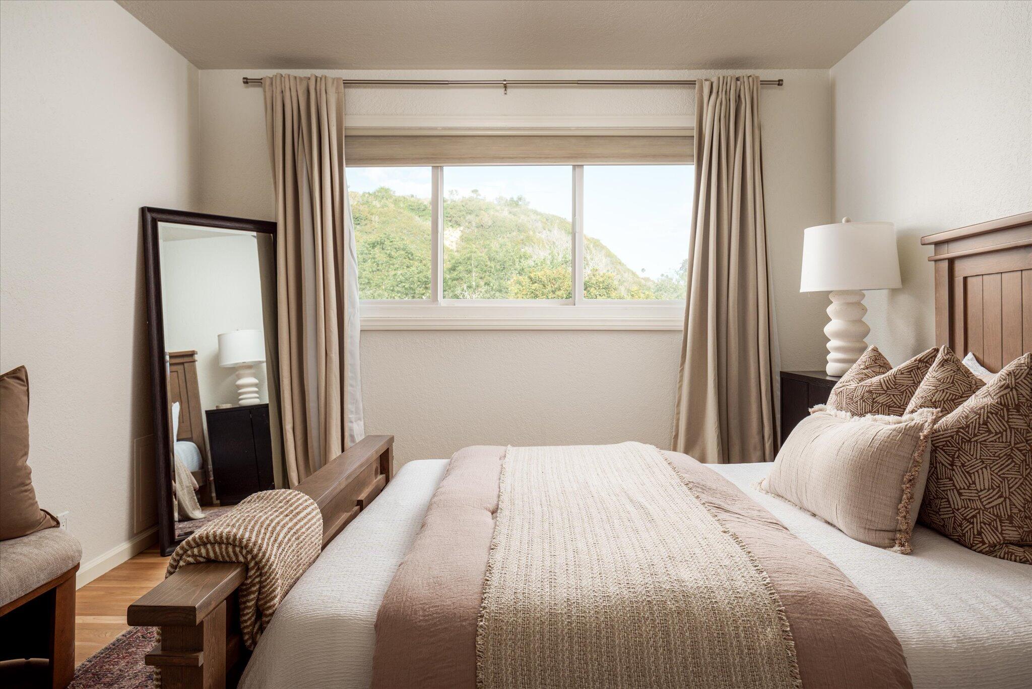 422 Alan Road Santa Barbara, CA 93109 - Photo 30 of 38 a bedroom with a bed and a window