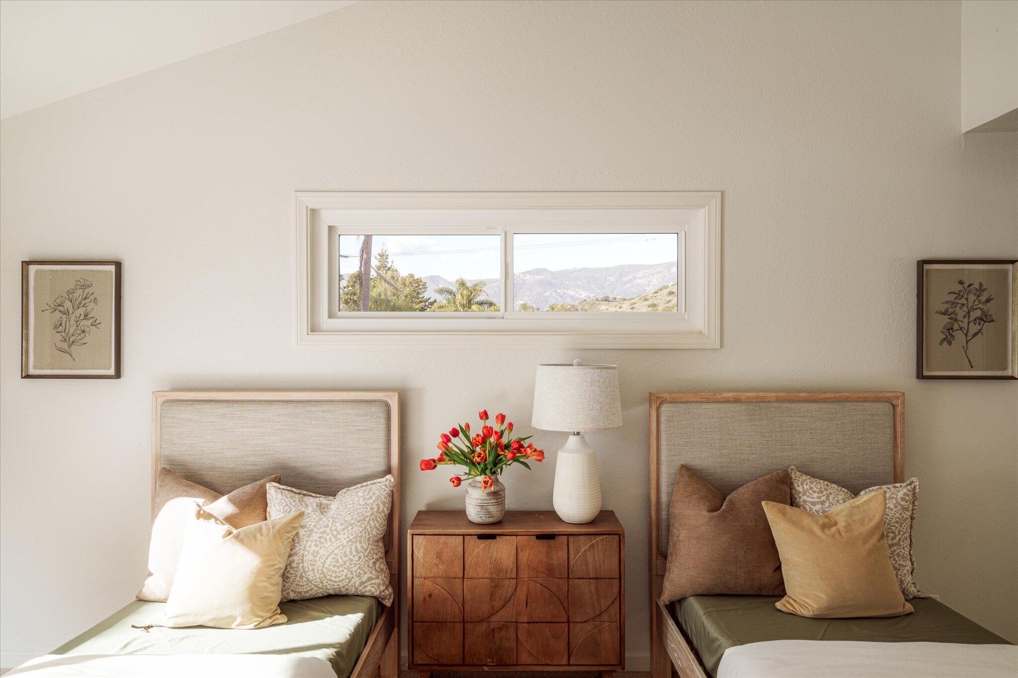 422 Alan Road Santa Barbara, CA 93109 - Photo 32 of 38 a living room with furniture and a potted plant