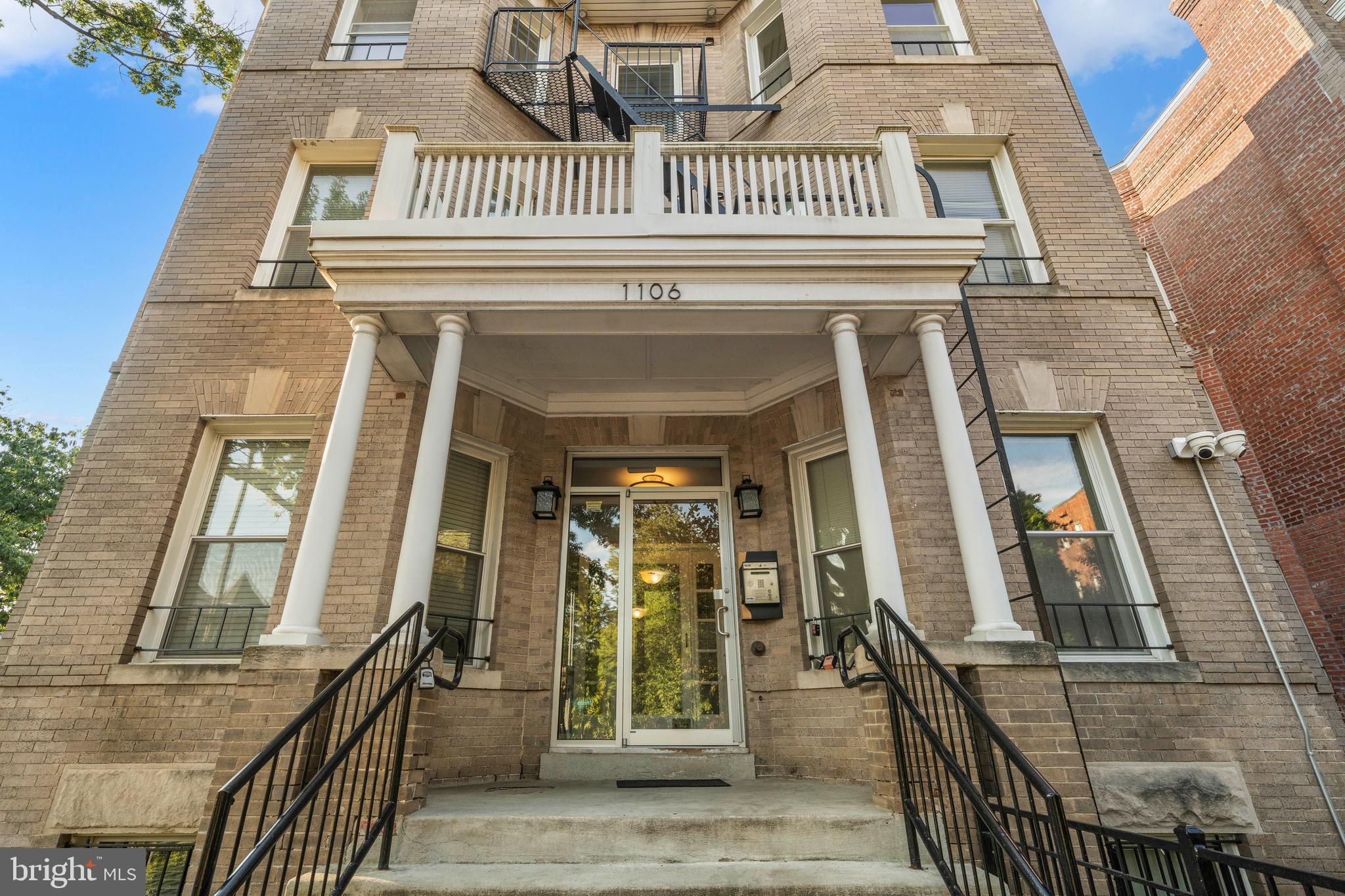 1106 Columbia Road Northwest, Unit 304 Washington, DC 20009 - Photo 23 of 24 front view of a house with a balcony