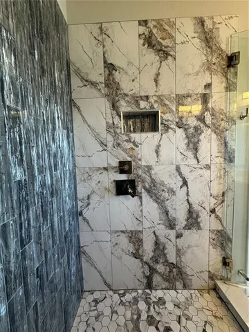 a view of a yard with a flower garden