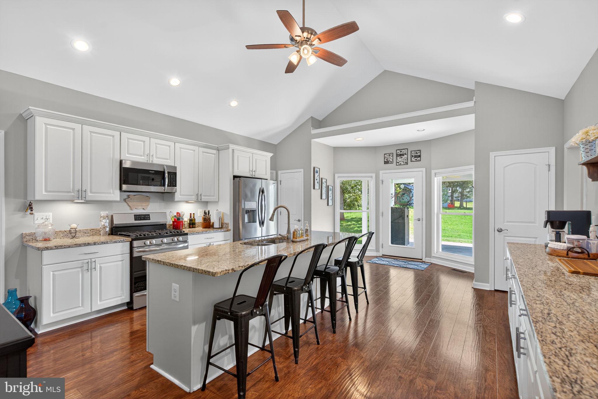 14451 Jenkins Ridge Road Culpeper, VA 22701 - Photo 13 of 78 a view of a dining room with furniture window and wooden floor