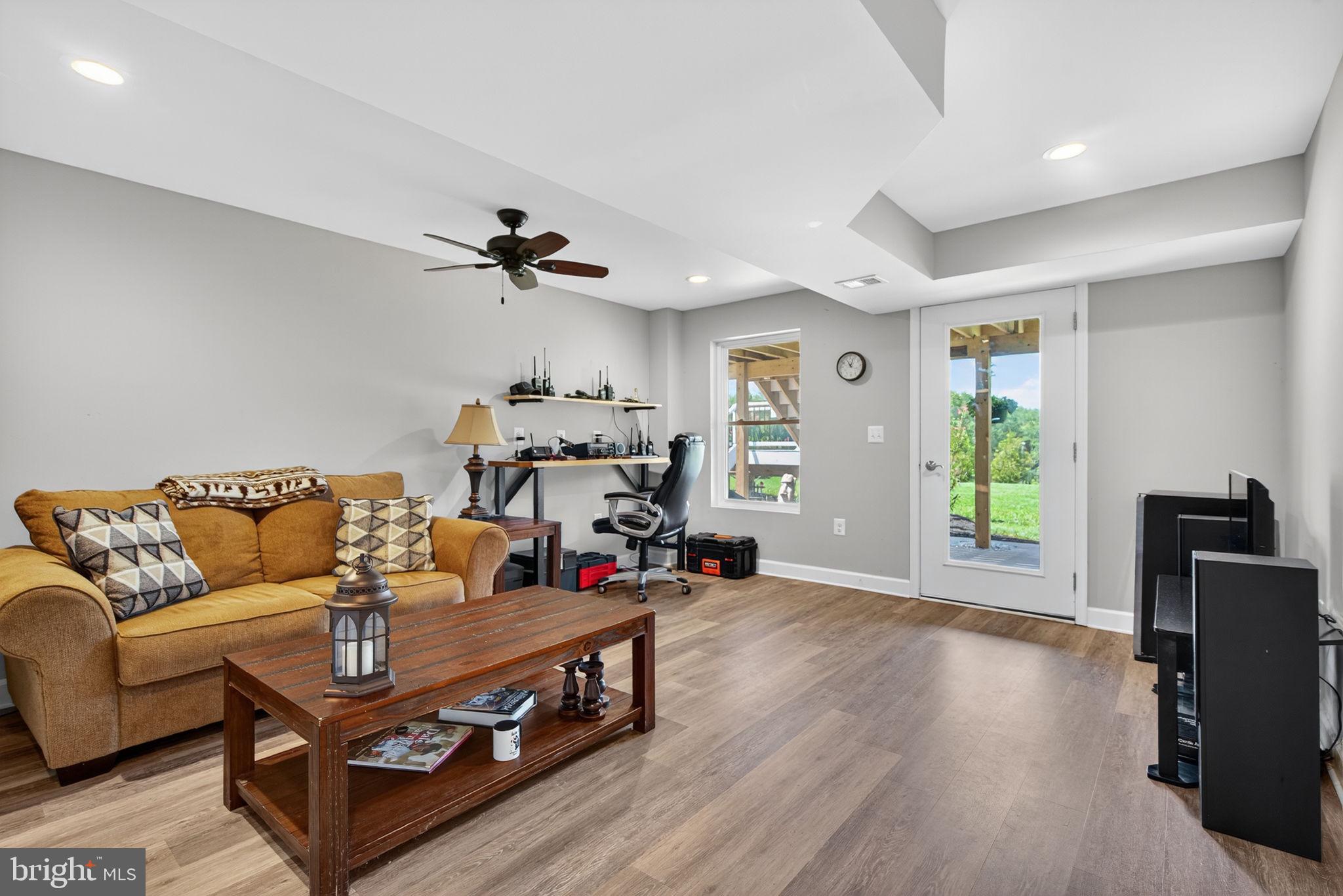 14451 Jenkins Ridge Road Culpeper, VA 22701 - Photo 32 of 78 a living room with furniture and a window