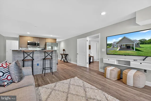a view of a house with backyard and porch