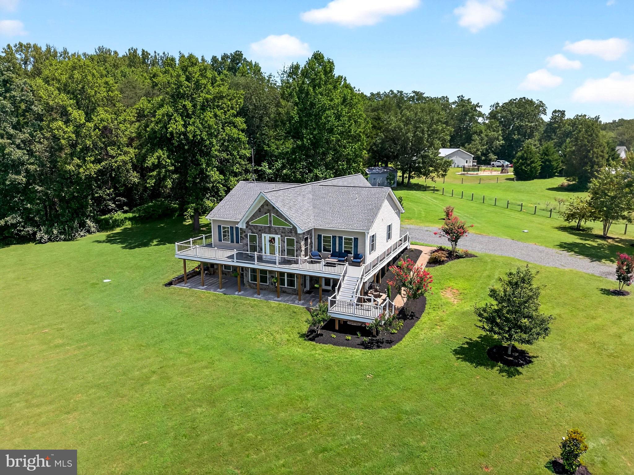 14451 Jenkins Ridge Road Culpeper, VA 22701 - Photo 66 of 78 an aerial view of a house with swimming pool garden and outdoor seating
