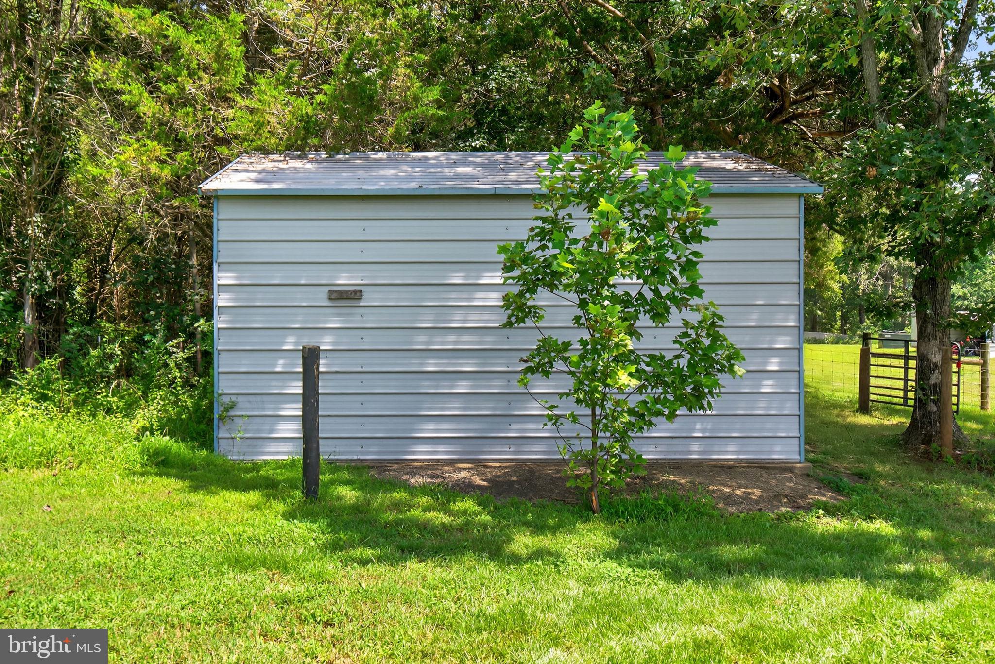 14451 Jenkins Ridge Road Culpeper, VA 22701 - Photo 73 of 78 a front view of a house with garden