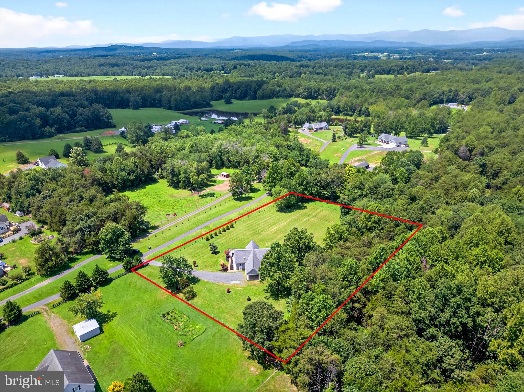14451 Jenkins Ridge Road Culpeper, VA 22701 - Photo 75 of 78 a view of a city with lush green forest