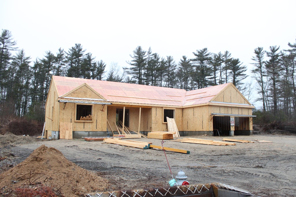 Lot 2 Donna Road Wareham, MA 02576 - Photo 3 of 4 a front view of a house with garage