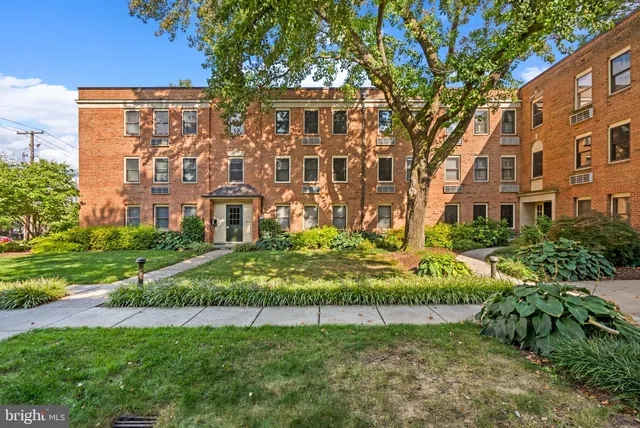 a view of a building with a garden