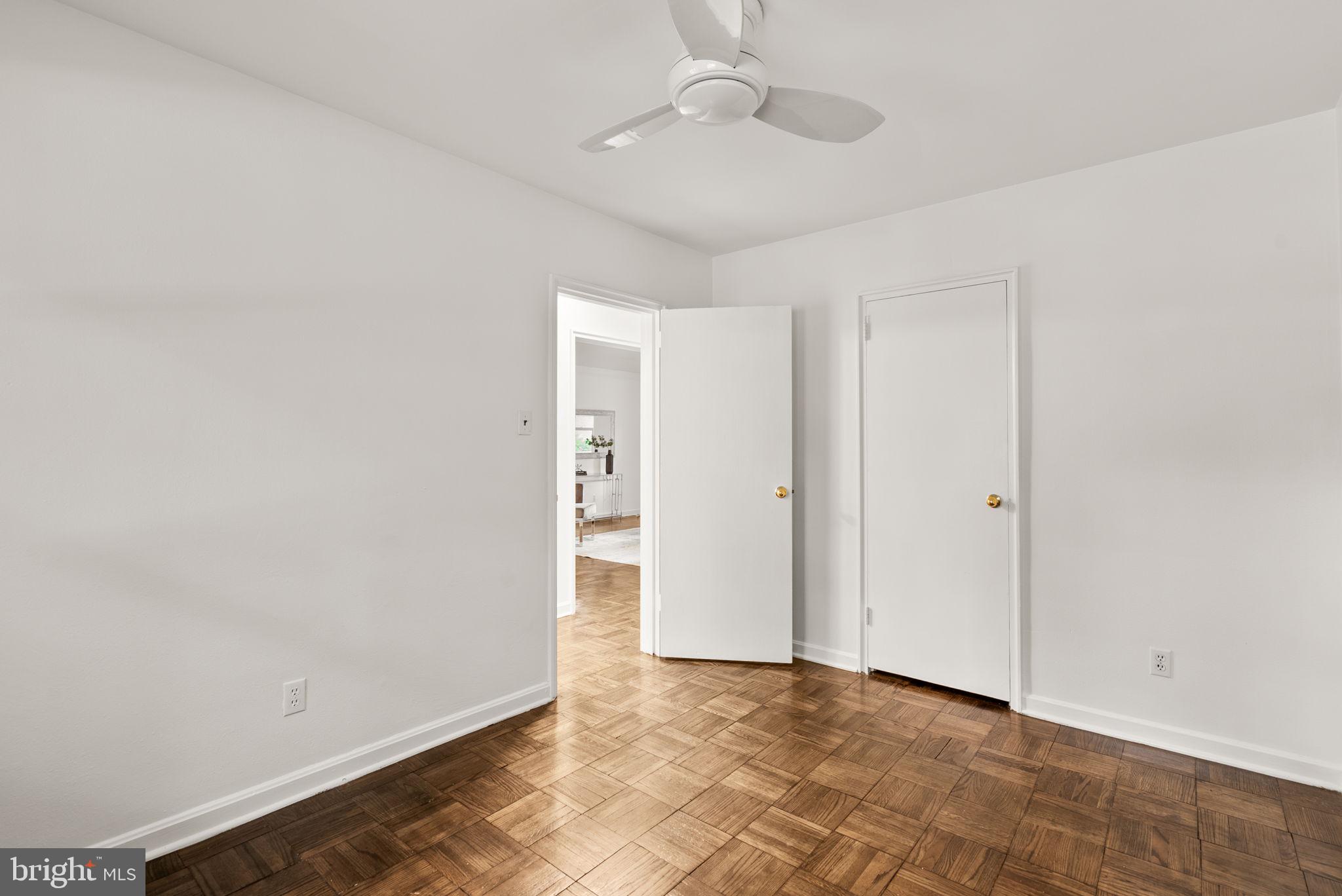 4820 Chevy Chase Drive, Unit 101 Chevy Chase, MD 20815 - Photo 21 of 30 wooden floor in an empty room
