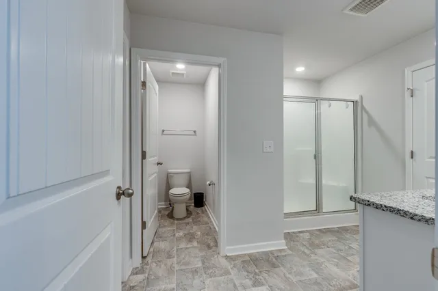 a bathroom with a sink and a shower