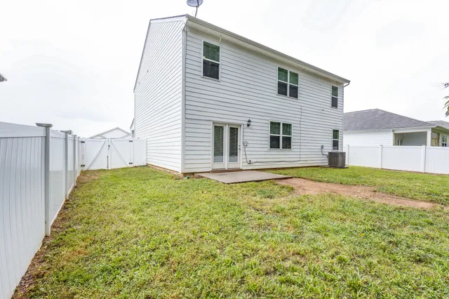 a house view with a garden space