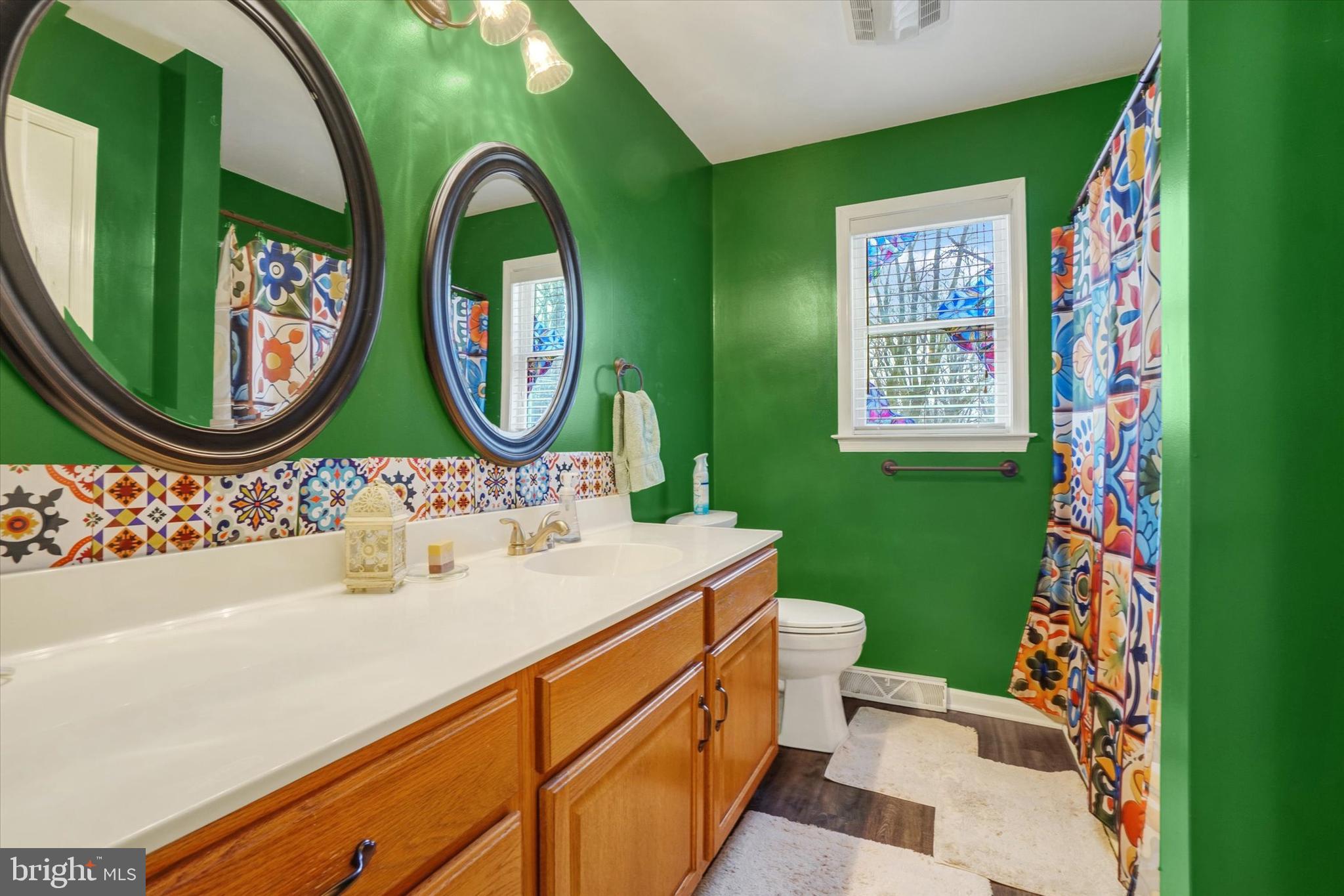 194 Willis Road Etters, PA 17319 - Photo 15 of 31 a bathroom with a sink mirror and toilet
